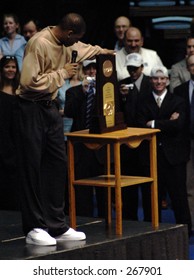 Rashad McCants Giving The 2005 NCAA National Championship Basketball Trophy A Look At The Welcome Home Ceremony At The Dean E. Smith Center.