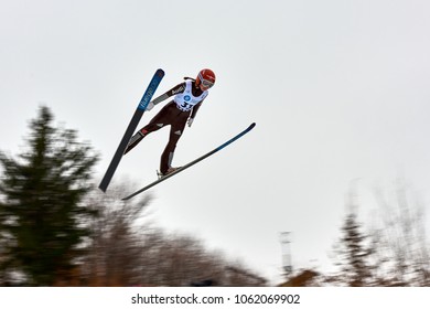 Rasnov, Romania - 3 March 2018: Unknown ski jumper compets to win the Ladies' FIS World Cup Ski Jumping event in Rasnov, Romania
