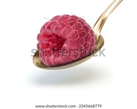 Rasp Berry into the spoon, Piece of raspberry isolated on white background