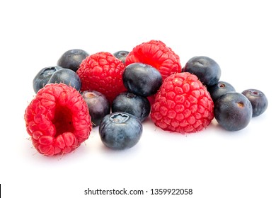 raspberries and blueberries isolated on white background