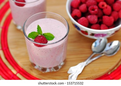 Raspberry Banana Oat Smoothie And Fresh Raspberries