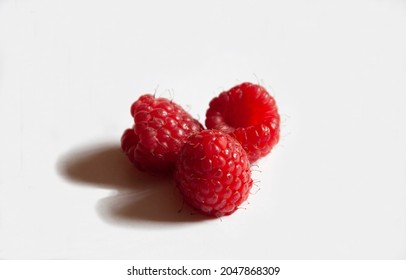 Raspberry berries on a white background. High quality photo