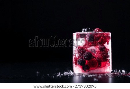 Raspberry and blueberry drink in a cup