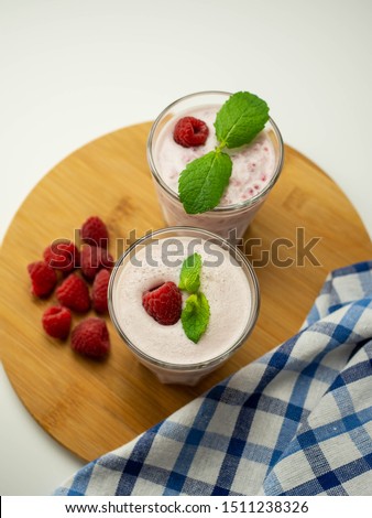 Similar – Chia yogurt with raspberries in a glass cup