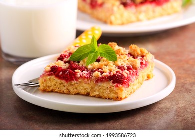 Raspberry Crumble Bars On Plate