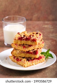 Raspberry Crumble Bars On Plate