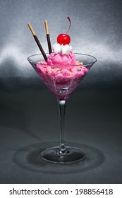 Raspberry Ice Cream In A Martini Glass With With Decoration