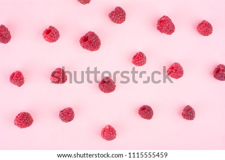 Raspberry isolated on pink background. Close up, pattern.