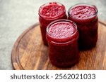 Raspberry jam in canning jars. Berry jam made from fresh home-grown fruits.