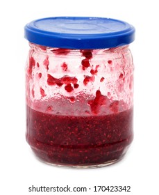 raspberry jam in a jar on a white background
