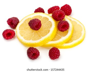 Raspberry And Lemon Isolated On White