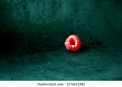 raspberry on a dark background
