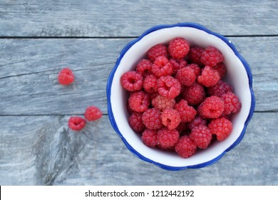 Raspberry on the table, top view. Forest or garden berries. Empty space for Your text.                               