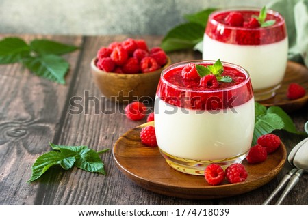 Raspberry Panna cotta with raspberry jelly, Italian dessert, homemade cuisine. Copy space.