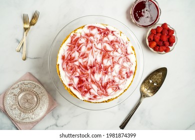 Raspberry Swirl Cheesecake With Graham Cracker Crust