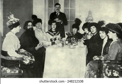 Rasputin, the favorite of the Russian Empress, with women admirers, 1911. His ability to ease the Czarevich's hemophilia made he became an influential figure in the Russian court.