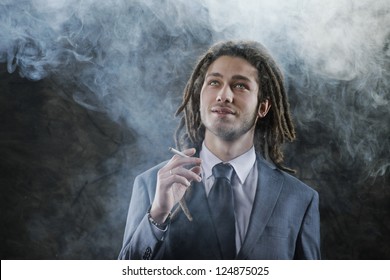 Rastafarian Businessman Smoking Marijuana