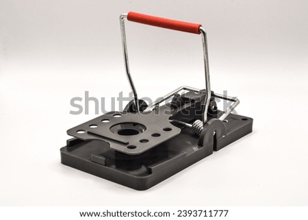 Rat snap rodent trap on a white background 