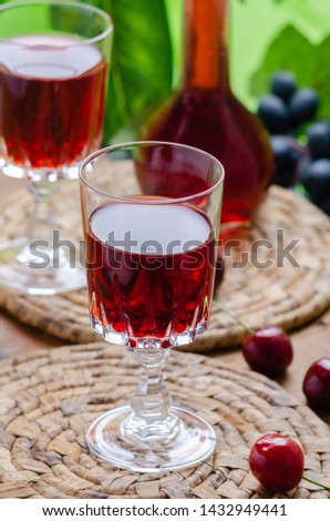 Ratafia - tipical Italian sweet alcoholic beverage, either a fruit-based beverage or a fortified wine with cherries. Rustic style.