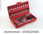 The Ratchet Socket Wrench Set includes various sockets, an extension bar, and a grip handle, providing versatility and ease for your hand tool needs