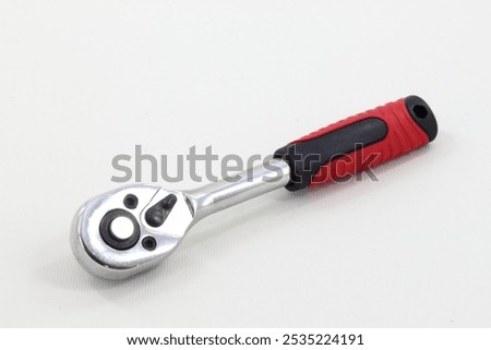 The Ratchet Socket Wrench Set includes various sockets, an extension bar, and a grip handle, providing versatility and ease for your hand tool needs