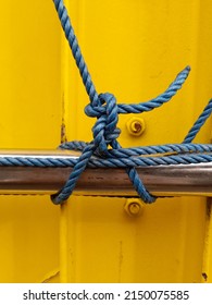 Ratchet Strap For HGV Goods Vehicle Securing A Load With The Strap On A Side Of A Semi Truck Trailer And Rolled Up Securley.