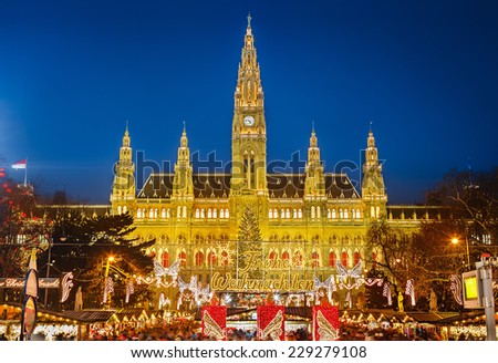 Rathaus and christmas market in Vienna, Austria Translation: Merry Christmas