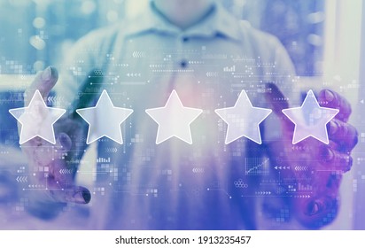 Rating Star Concept With Young Man Holding His Hands