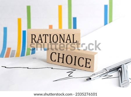 RATIONAL CHOICE text on wooden block on chart background, business concept
