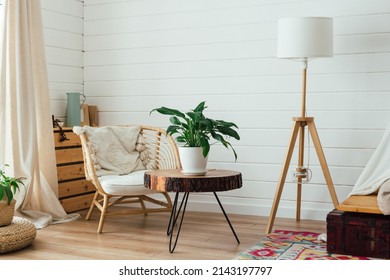 Rattan Armchair And Floor Lamp In Living Room Interior With Plants. Cozy Interior In Boho Style. SOFT FOCUS - Image