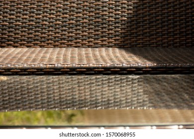 Rattan Garden Couch With Glass Table In Close Up