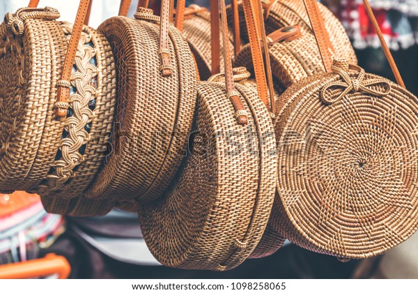 Rattan\
round bags at a street shop. Bali,\
Indonesia.
