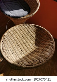 A Rattan Stool As A Seat.