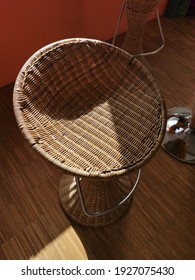 A Rattan Stool As A Seat.