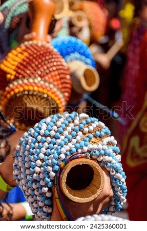 A rattle of African origin called xereque brought to Brazil by slaves and used in samba, carnival, umbanda and candomble