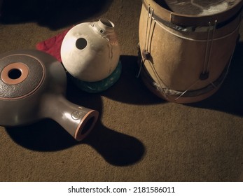 A Rattle Or Shekere, An African Rhythm Instrument Made From Beads Strung Around A Gourd Which Produces A Rattling Sound