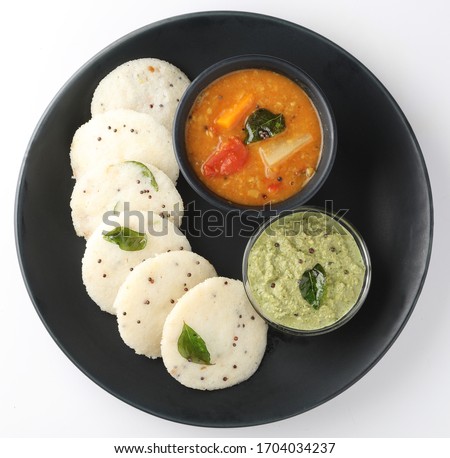 Rava Idly sambar or Idli with Sambhar and green, Popular South indian breakfast