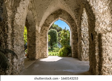 Ravello, Amalfi Coast, Italy. Villa Rufolo, view through the arches and a glimpse of the garden in background.
