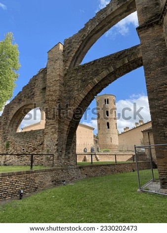 Ravenna, in the region of Emilia-Romagna (Italy) was the capital of the Western Roman Empire. The Basilica of San Vitale is of Byzantine art and architecture. Behind brick tower.