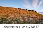 Ravensheugh Crags to the west, a popular spot with climbers this sandstone crag has 134 documented climbing routes and is located in Northumberland National Park near Simonburn, North East England