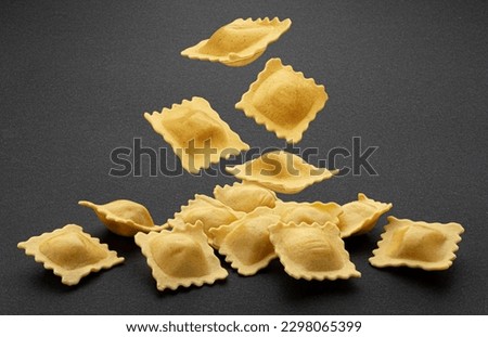 Ravioli pasta on black background