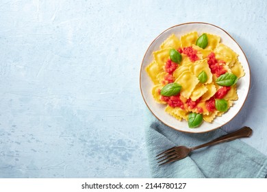 Ravioli With Red Tomato Sauce And Basil, Overhead Shot With A Place For Text. Vegan Italian Dinner