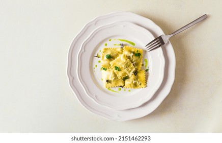 Ravioli With Spinach And Cheese, Green Sauce, On A Light Background, Selective Focus, No People,