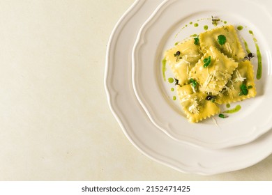 Ravioli With Spinach And Cheese, Green Sauce, On A Light Background, Selective Focus, No People,