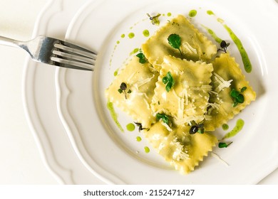 Ravioli With Spinach And Cheese, Green Sauce, On A Light Background, Selective Focus, No People,