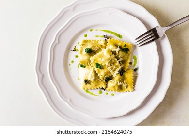 Ravioli With Spinach And Cheese, Green Sauce, On A Light Background, Selective Focus, No People,