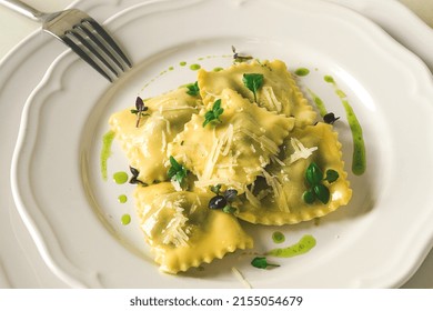 Ravioli With Spinach And Cheese, Green Sauce, On A Light Background, Selective Focus, No People,