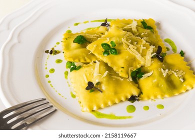 Ravioli With Spinach And Cheese, Green Sauce, On A Light Background, Selective Focus, No People,