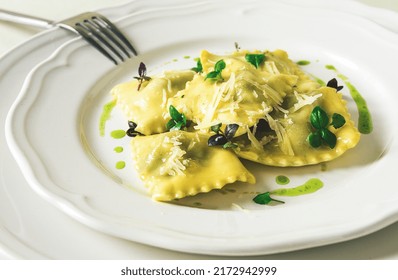 Ravioli With Spinach And Cheese, Green Sauce, On A Light Background, Selective Focus, No People,