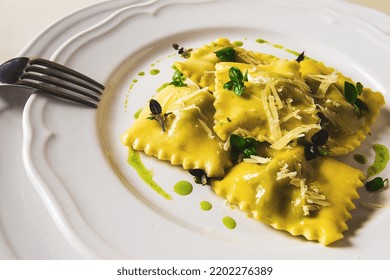 Ravioli With Spinach And Cheese, Green Sauce, On A Light Background, Selective Focus, No People,